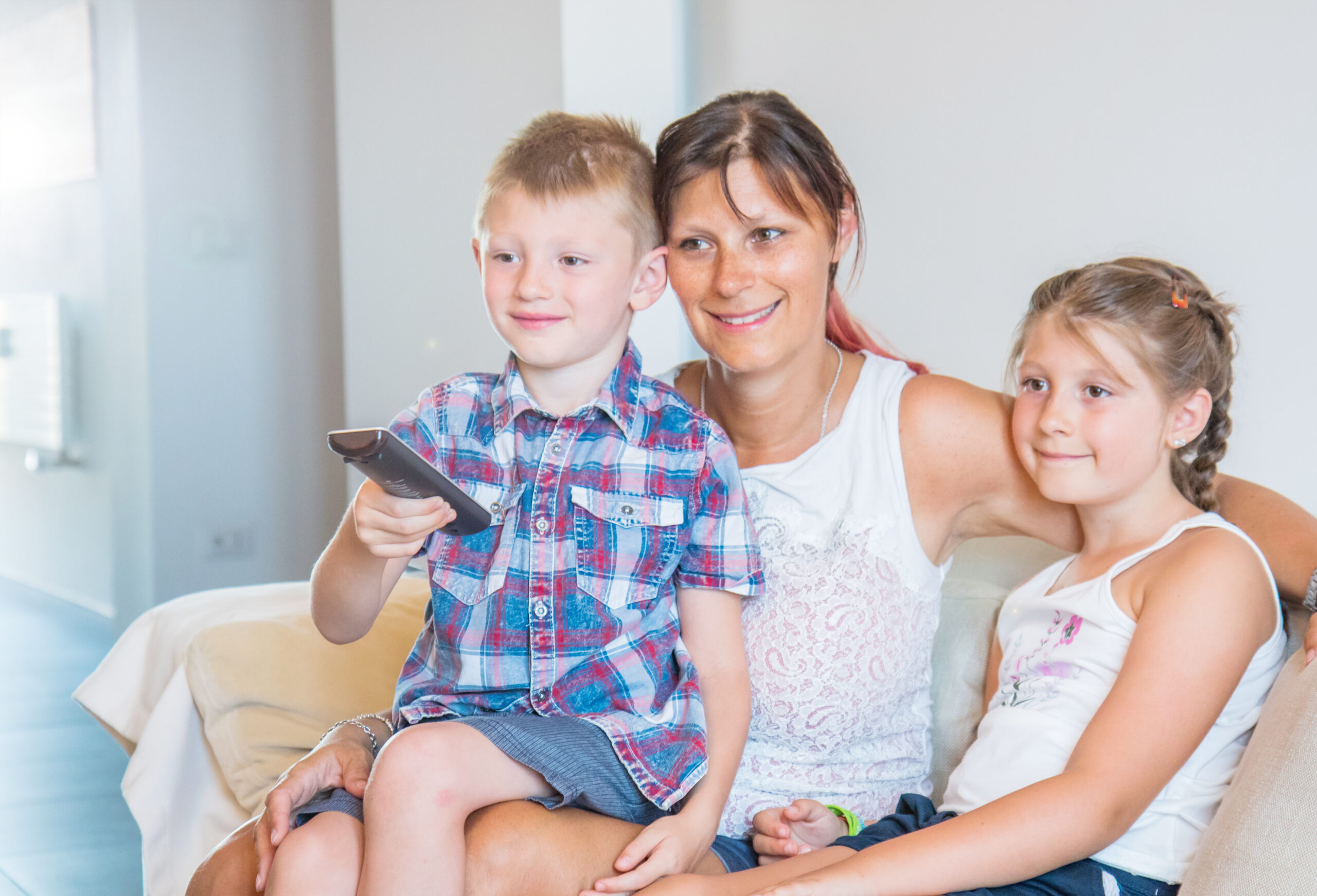 Mom and kids watching TV